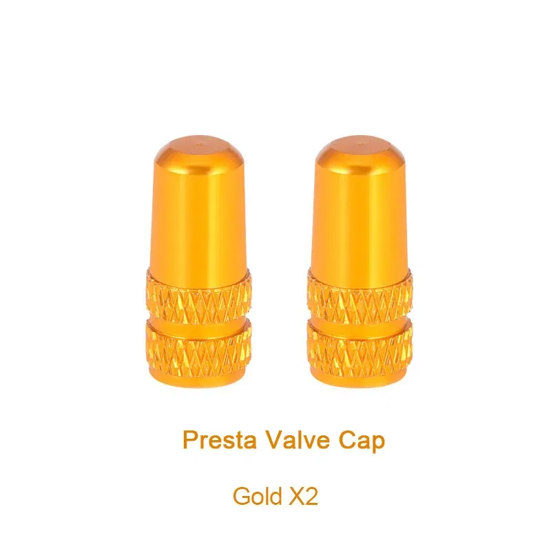 Color: Brown - 2pc Bicycle Valve Cap Aluminum Alloy Presta/Schrader Road Mountain Bike Tire Valve Cap Dust Protection Cover Bicycle Accessories