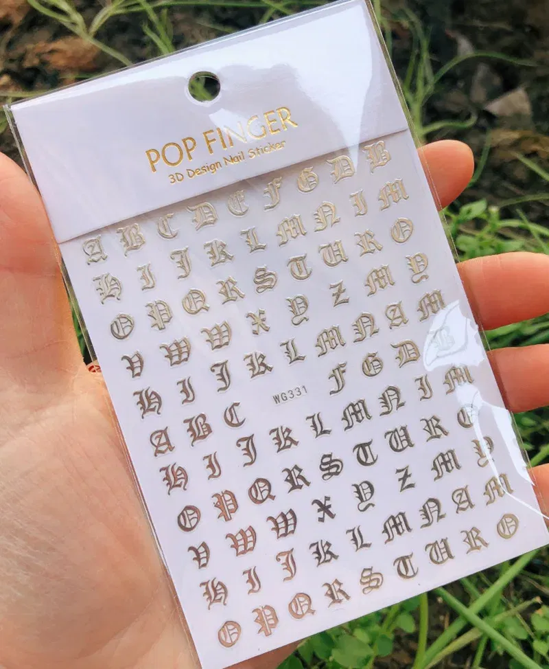 Color: Chocolate - 1PCS New English Alphabet Nail Stickers Multi-Color Laser Reflective Nail Slider Art Cool Text Nail Kit