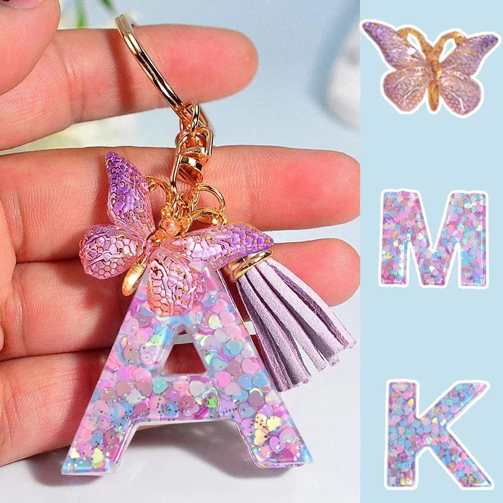 Color: Ivory - Fashion Tassel Butterfly 26Letter Keychain Colorful Love Heart Filled Resin Alphabet Keyring Women Girls Car Bag Phone Pendant