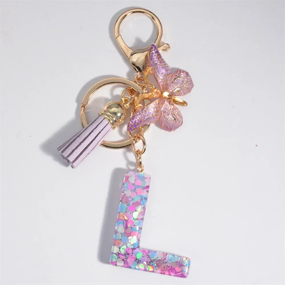 Color: Ivory - Fashion Tassel Butterfly 26Letter Keychain Colorful Love Heart Filled Resin Alphabet Keyring Women Girls Car Bag Phone Pendant