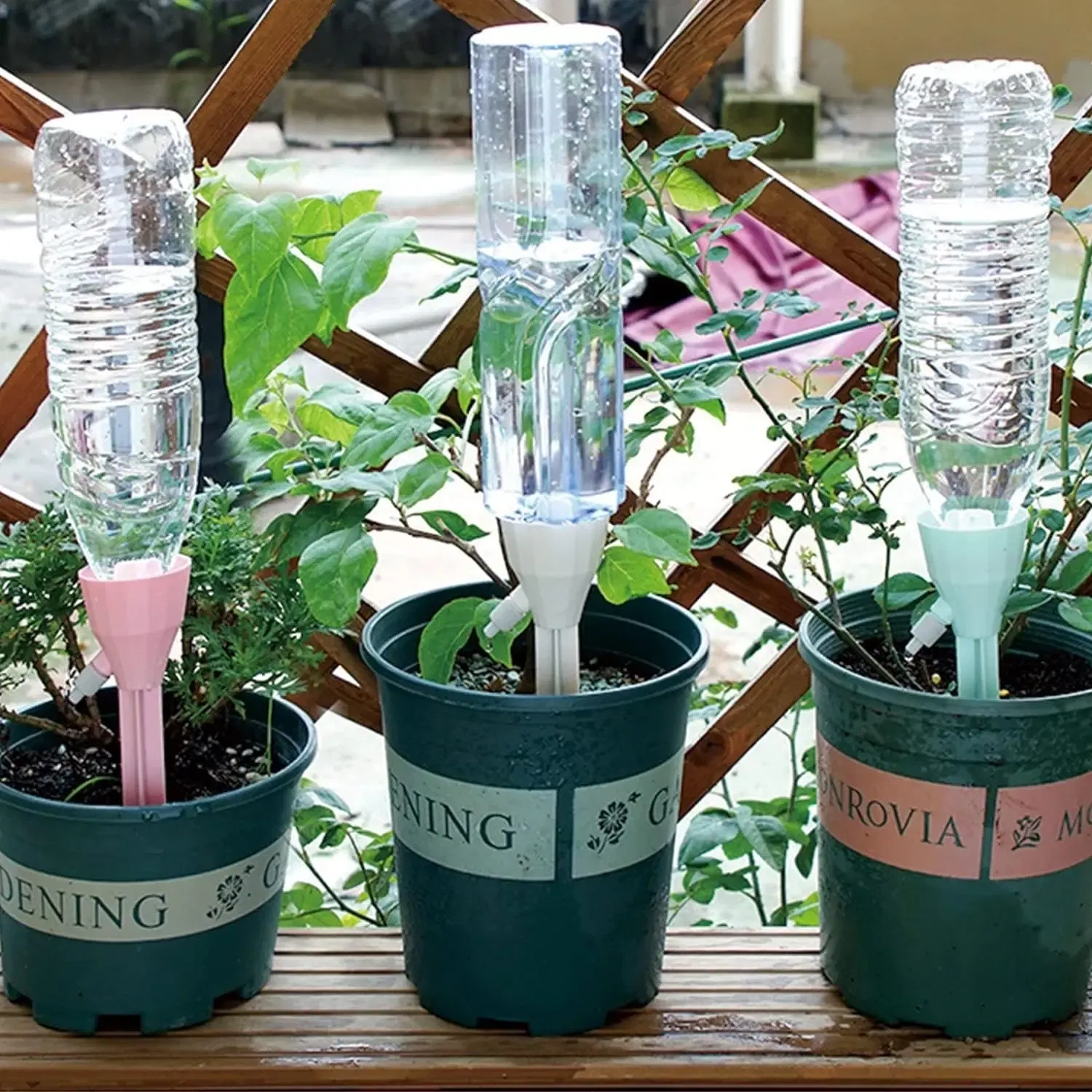 Color: Red - Drip Waterer Watering Device Household Timer Waterer Drip Irrigation Travel Water Seepage Sprinkler Automatic Watering Home