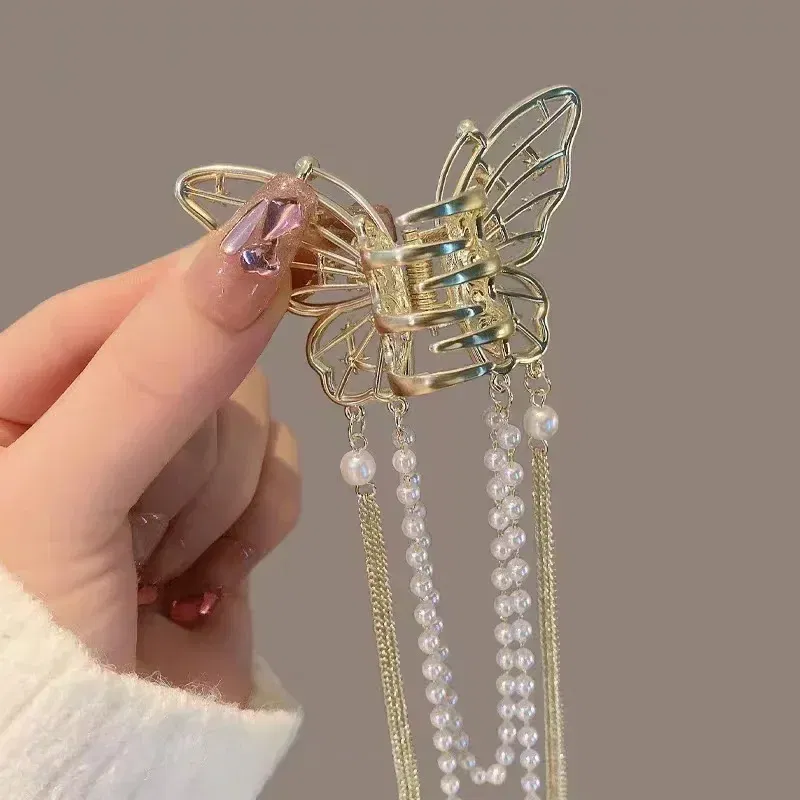 Color: Yellow - 2024 New Super Immortal Hollow Butterfly Tassel Women's Grab Clip Half Tie Hair Fashion Girl Pearl Pendant Hair Card Shark Clip