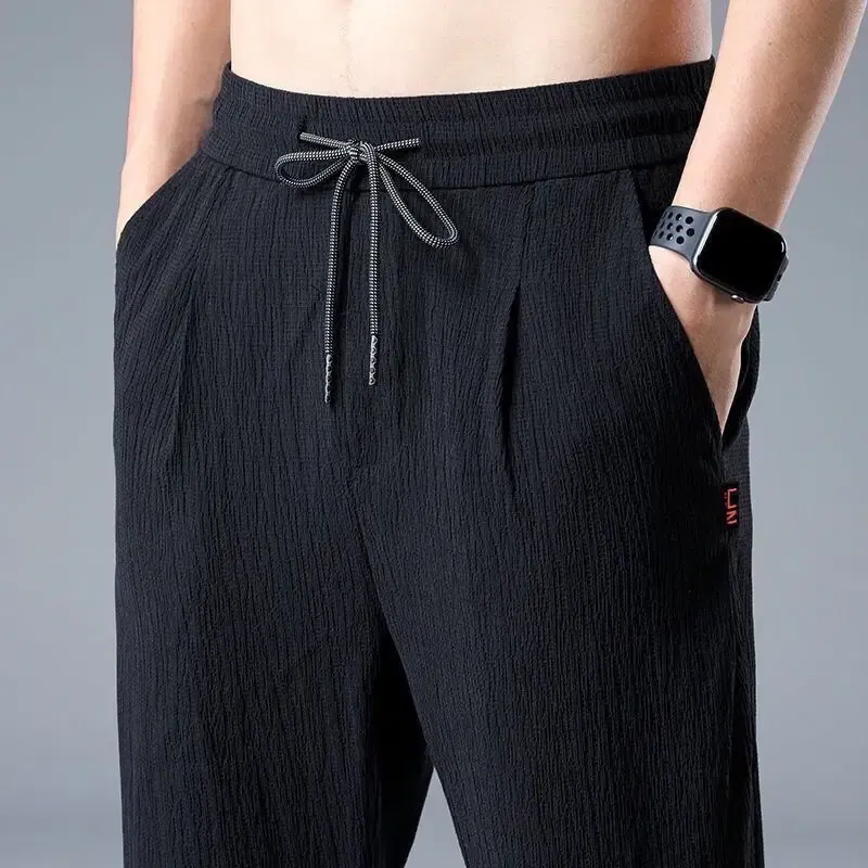 Color: black, Size: XXXL - Summer Ice Silk Man Jogger Linen Pants Casual Wide Summer Sweatpants Male Spring Lightweight Halking Harem Trousers