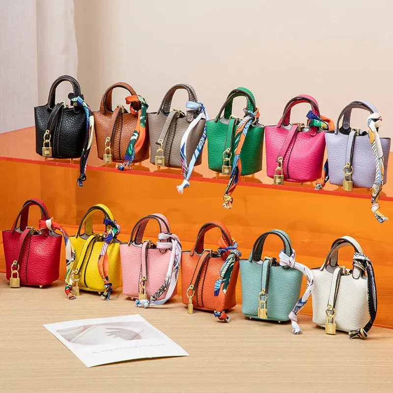 Color: green - Mini Bag Pendant Keychain Hanging Accessory Zero Wallet Creative Portable Bracelet Bluetooth Earphone Bag Multifunctional