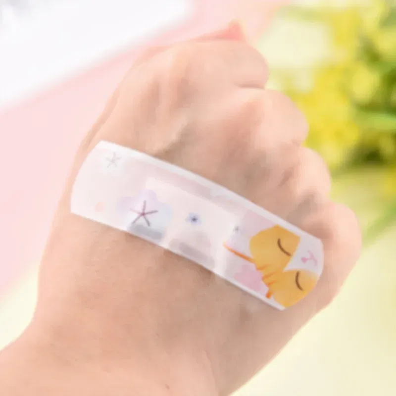 Color: WHITE - 20pcs/lot Kawaii Cartoon Dinosaur Pattern Self-adhesive Band Aid Hemostasis Bandages Dressing Patches Tape Plaster for Children