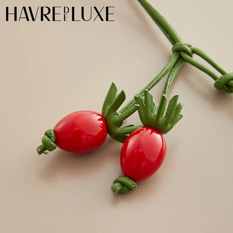 Color: Beige - Cowhide bag charm exquisite tomato string pendant woman all-match cute backpack pendant bag accessories