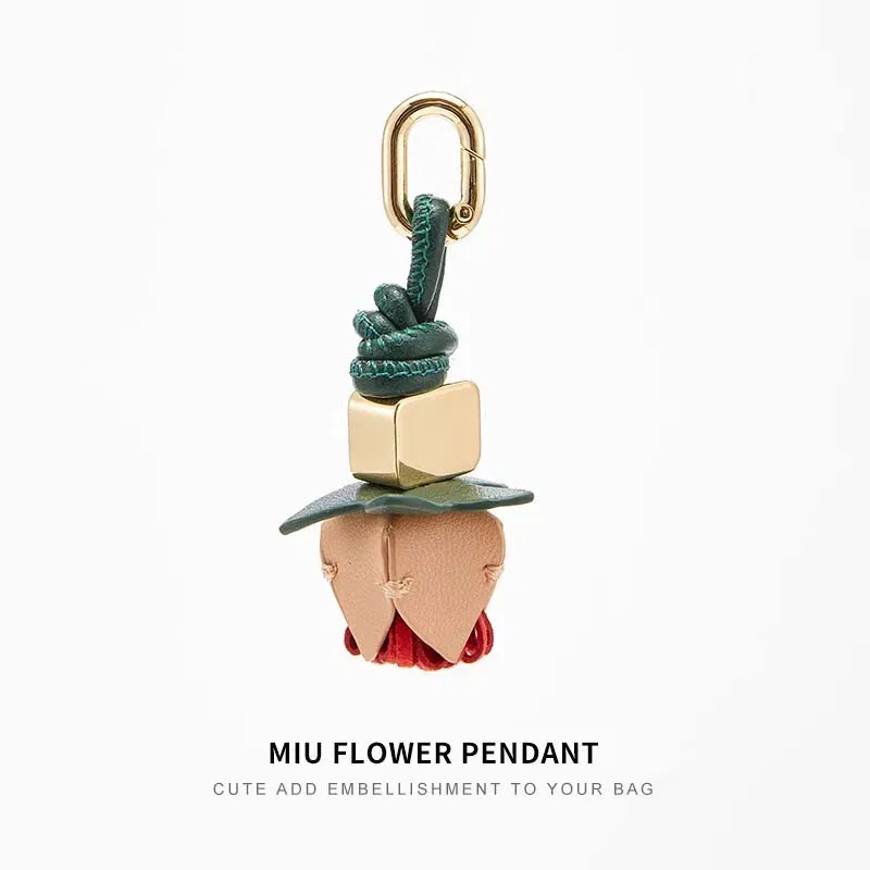 Color: Beige - Cowhide bag charm exquisite tomato string pendant woman all-match cute backpack pendant bag accessories