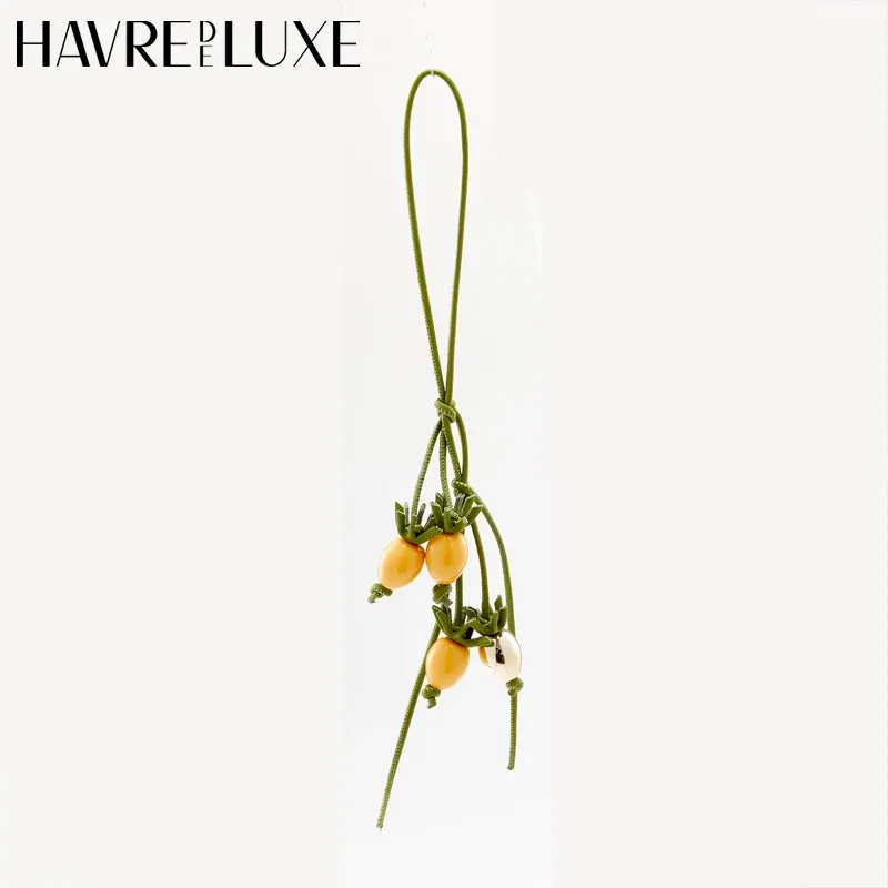 Color: Gold - Cowhide bag charm exquisite tomato string pendant woman all-match cute backpack pendant bag accessories
