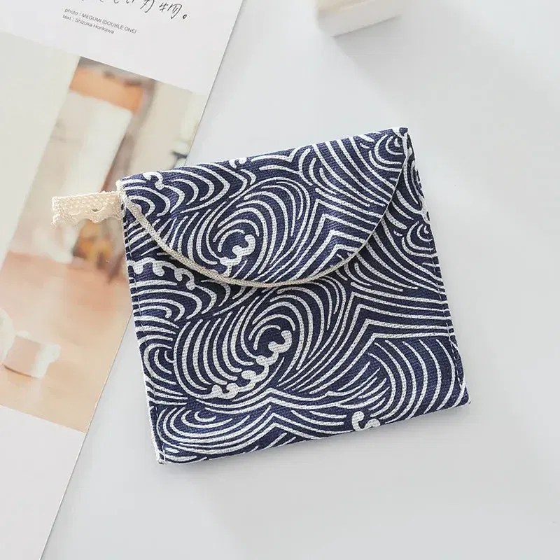 Color: PURPLE - Portable Women Cosmetic Organizer Sanitary Napkin Storage Bag Girls Ladies Cute Coin Card Sanitary Pad Pouch Small Cosmetic Bag