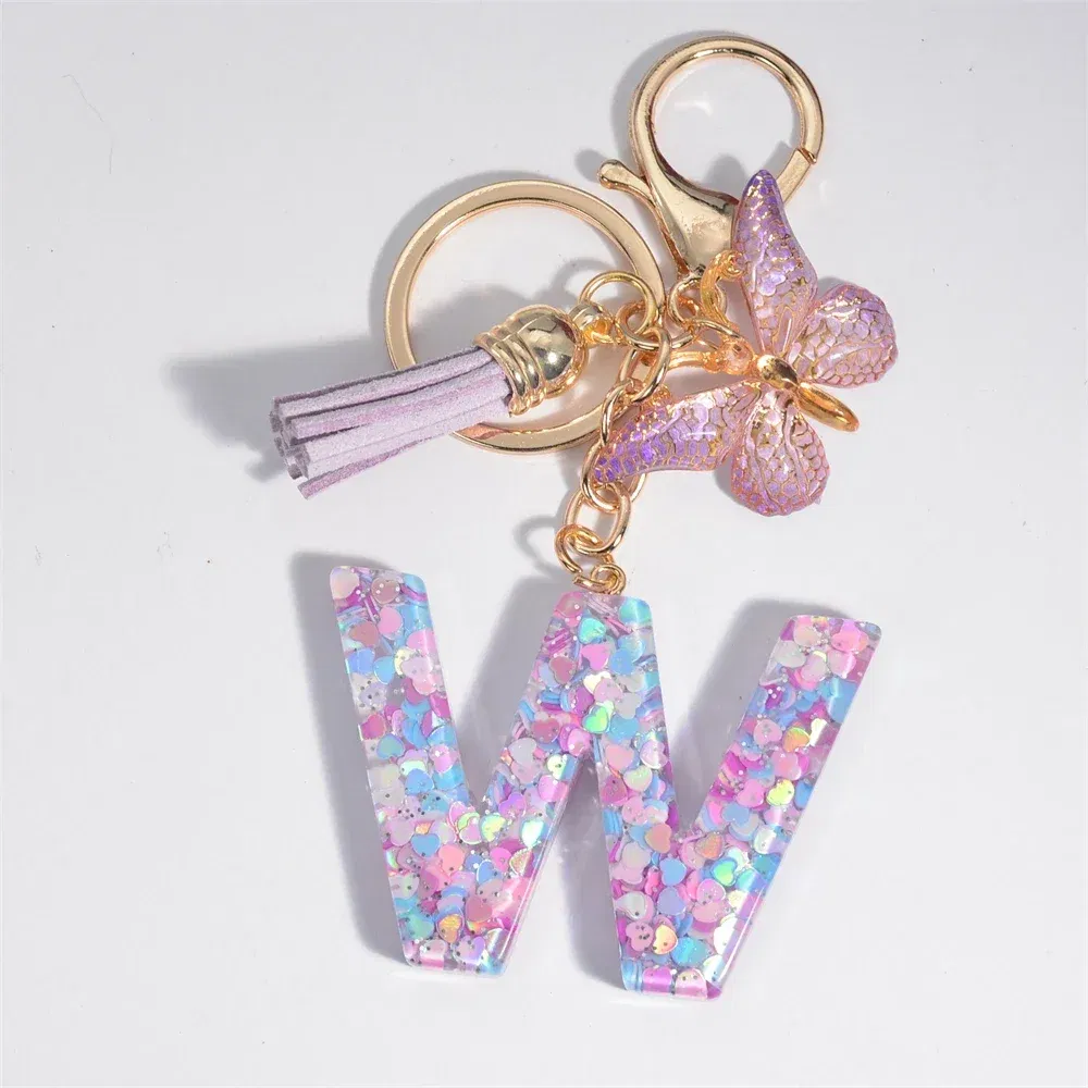 Color: Yellow - Fashion Tassel Butterfly 26Letter Keychain Colorful Love Heart Filled Resin Alphabet Keyring Women Girls Car Bag Phone Pendant