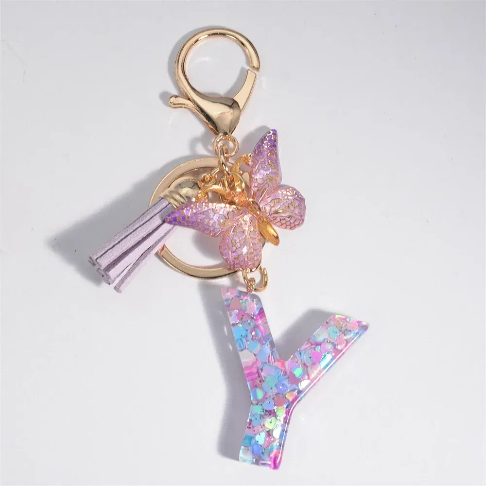 Color: Orange - Fashion Tassel Butterfly 26Letter Keychain Colorful Love Heart Filled Resin Alphabet Keyring Women Girls Car Bag Phone Pendant