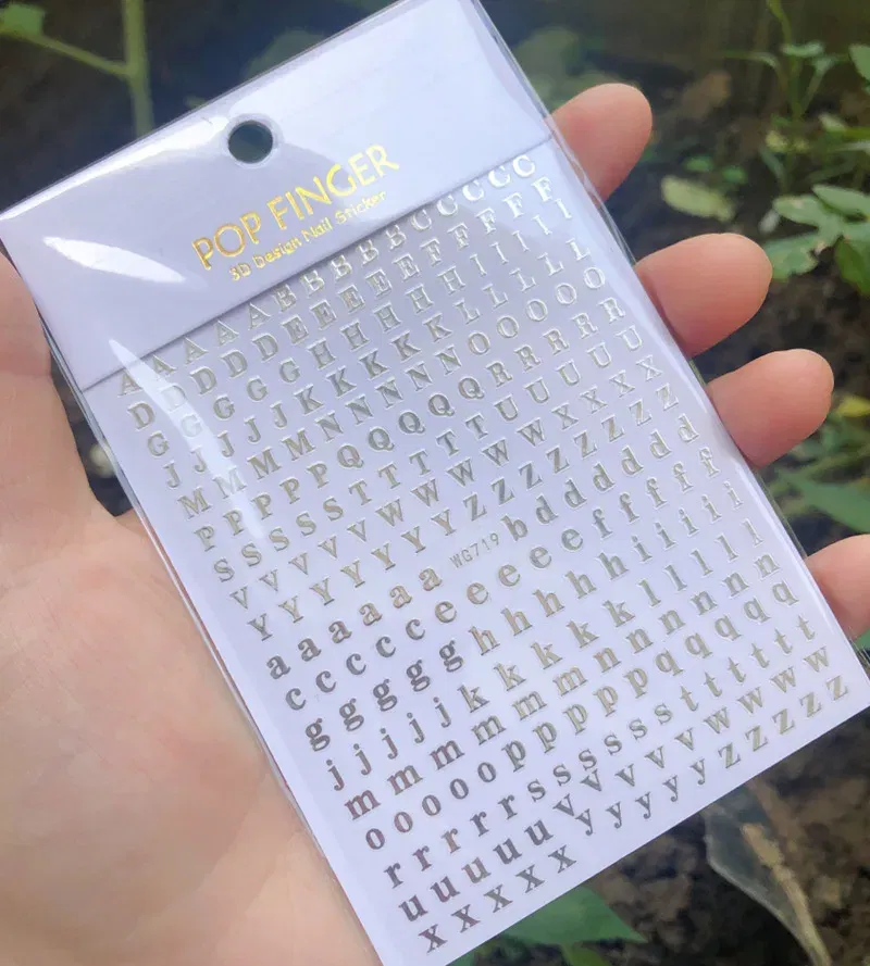 Color: Red - 1PCS New English Alphabet Nail Stickers Multi-Color Laser Reflective Nail Slider Art Cool Text Nail Kit