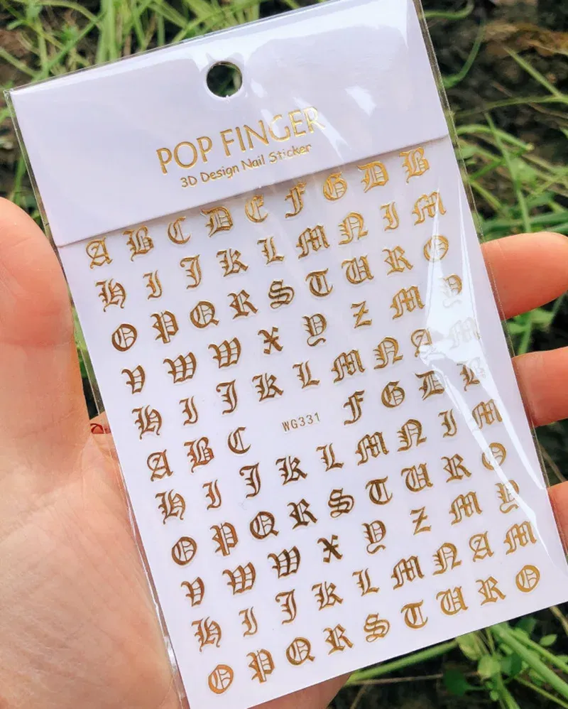 Color: MULTI - 1PCS New English Alphabet Nail Stickers Multi-Color Laser Reflective Nail Slider Art Cool Text Nail Kit