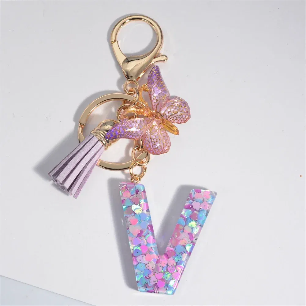 Color: Amy Green - Fashion Tassel Butterfly 26Letter Keychain Colorful Love Heart Filled Resin Alphabet Keyring Women Girls Car Bag Phone Pendant
