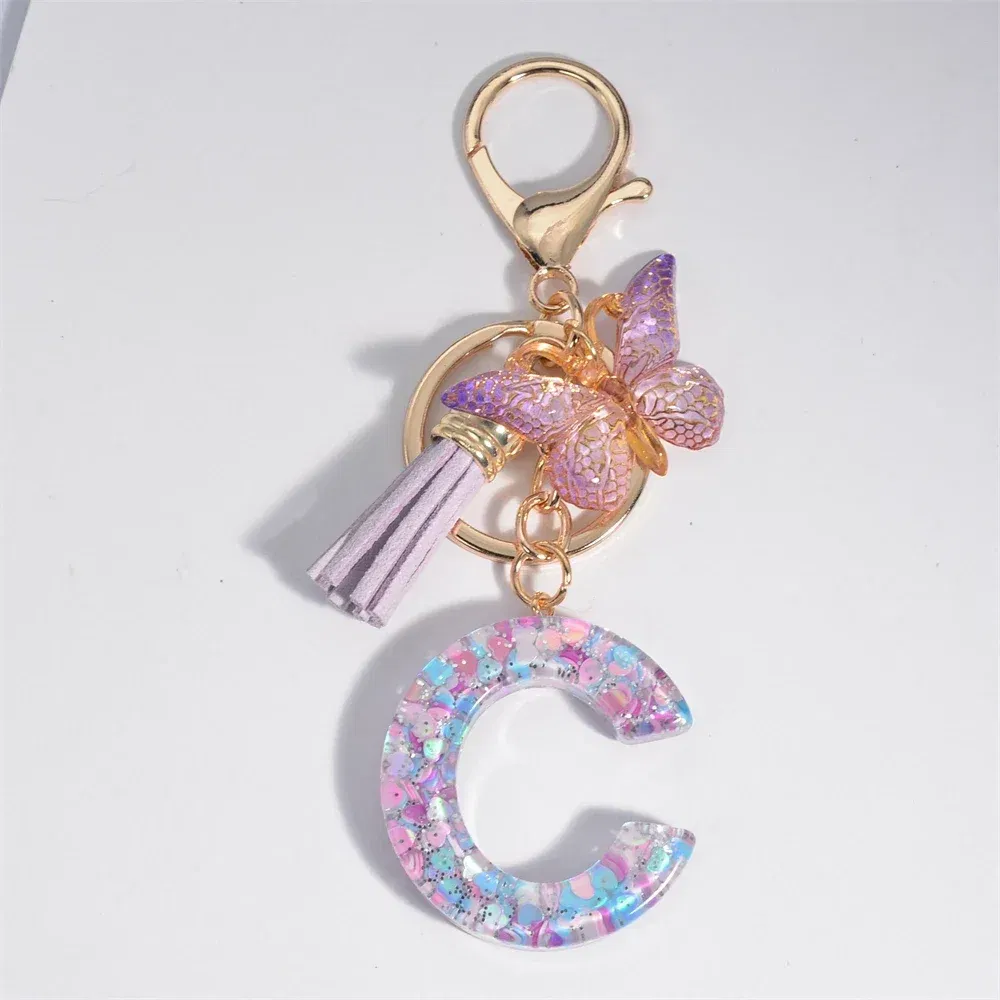 Color: green - Fashion Tassel Butterfly 26Letter Keychain Colorful Love Heart Filled Resin Alphabet Keyring Women Girls Car Bag Phone Pendant