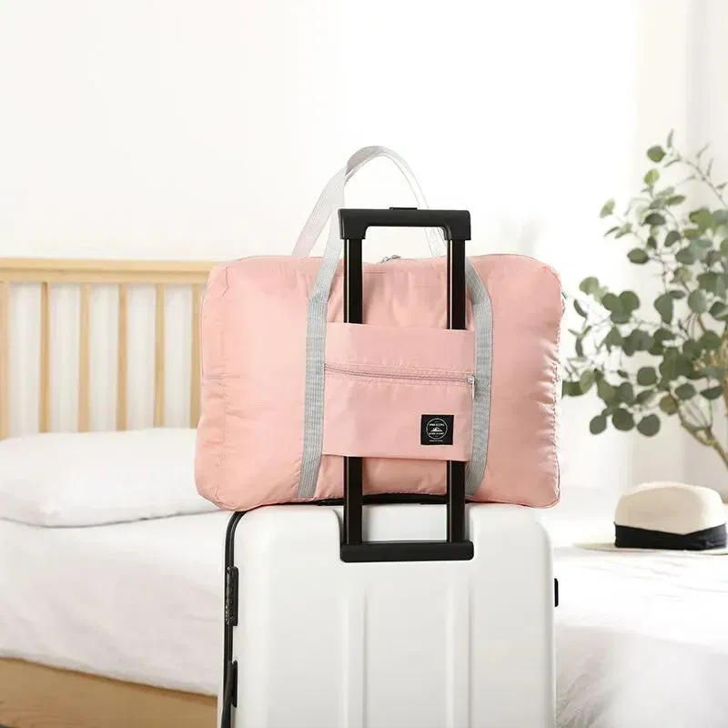 Color: Pink - Foldable Travel Duffel Bag for Airlines Carry on Bag for Women and Girls Lightweight Large Capacity Sports Weekend Trip Overnigh