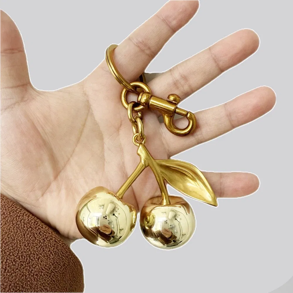 Color: Bronze - Fashion Glitter Gold Cherry Keychain Summer Fruits Cherries Pendant Keyring For Women Men Jewelry Bag Accessories Gift