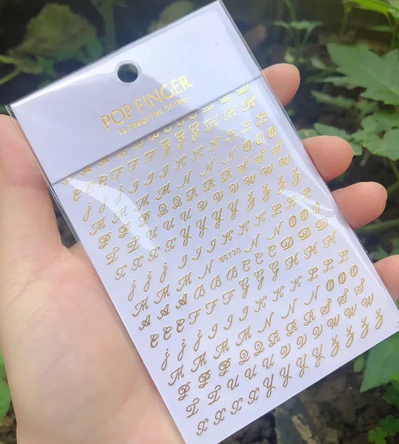 Color: Amy Green - 1PCS New English Alphabet Nail Stickers Multi-Color Laser Reflective Nail Slider Art Cool Text Nail Kit