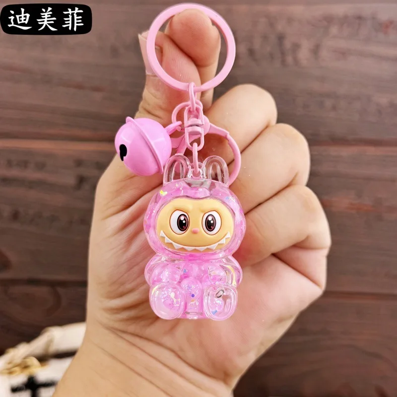 Color: Yellow, Ships From: CHINA - Creative keychain oil series doll quicksand bottle small pendant gift decoration