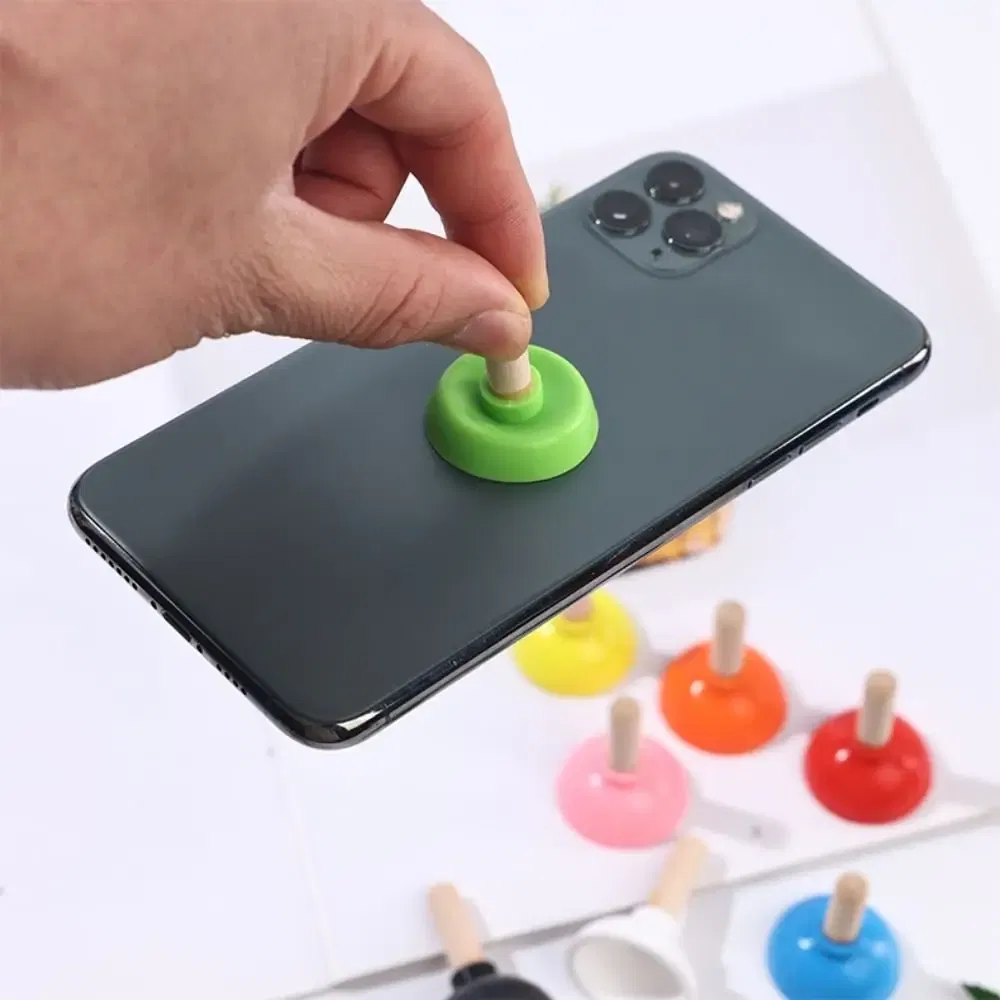 Color: Sapphire - Mini Colorful Toilet Shape Plunger Phone Holder Sucker Stand Tiny Plunger Magic Tricks Inspired Looking For Card Professional