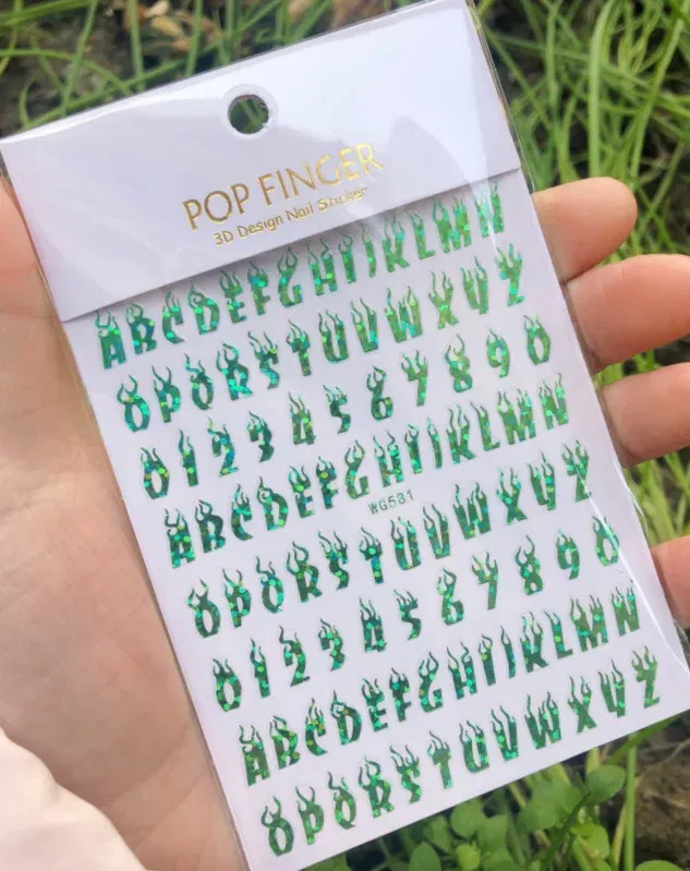 Color: Mixed Colors - 1PCS New English Alphabet Nail Stickers Multi-Color Laser Reflective Nail Slider Art Cool Text Nail Kit