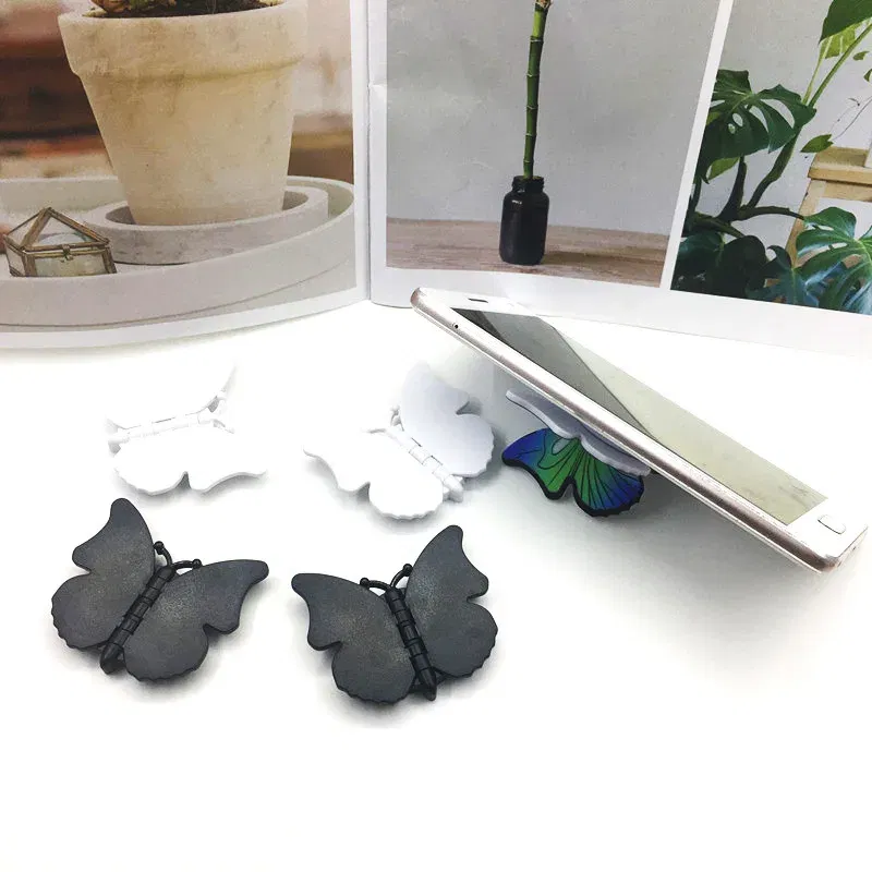 Color: WHITE - 2pcs 360 Degree Phone Ring Stand Holder Butterfly Bling Glitter Universal Butterfly Wing holder finger ring holder