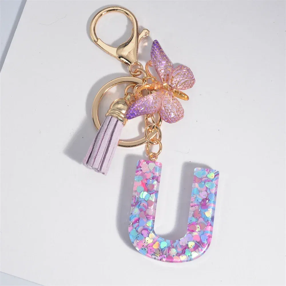 Color: dark blue - Fashion Tassel Butterfly 26Letter Keychain Colorful Love Heart Filled Resin Alphabet Keyring Women Girls Car Bag Phone Pendant