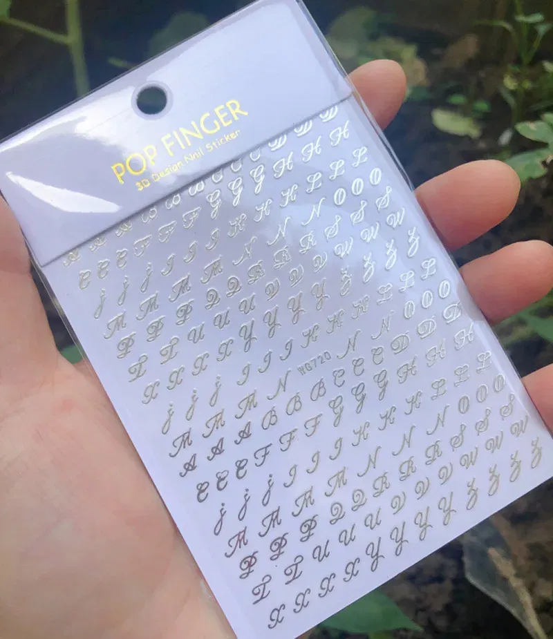 Color: SKY BLUE - 1PCS New English Alphabet Nail Stickers Multi-Color Laser Reflective Nail Slider Art Cool Text Nail Kit